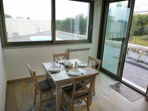 Bazén v ubytování Sicily Rooms Appartamenti nebo v jeho okolí