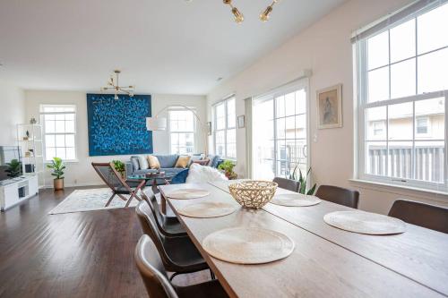 a large living room with a table and chairs at NEW Luxury Quiet Island Atlantic City Getaway in Atlantic City
