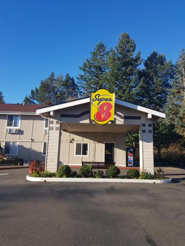 a shell gas station with a sign on it at Super 8 by Wyndham Shelton in Shelton