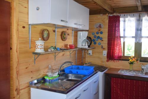 Kuchyň nebo kuchyňský kout v ubytování Cabaña Picaflores