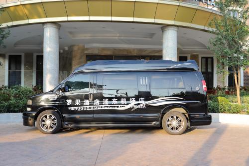 a black van parked in front of a building at Shanghai Menglong Hotel Management in Shanghai