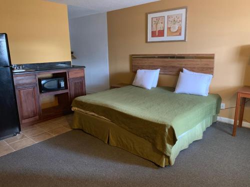 Voodi või voodid majutusasutuse La Vista Inn toas