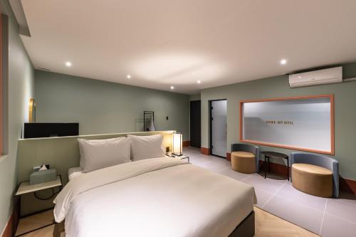 Postel nebo postele na pokoji v ubytování Brown Dot Hotel Seong Seo