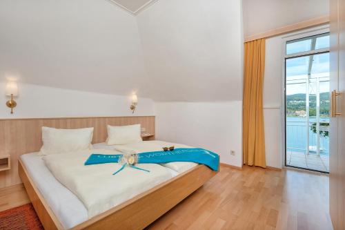 Ένα ή περισσότερα κρεβάτια σε δωμάτιο στο Appartements Schwarzvilla