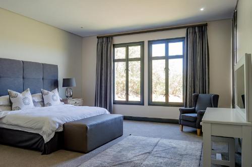 Ένα ή περισσότερα κρεβάτια σε δωμάτιο στο House 217 Gowrie Farm Estate