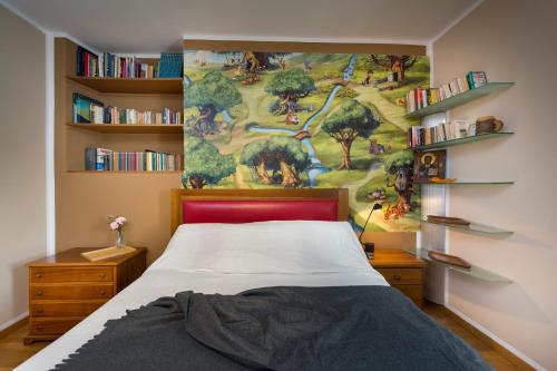 Säng eller sängar i ett rum på CASA NEL RUSTICO Foresteria Lombarda