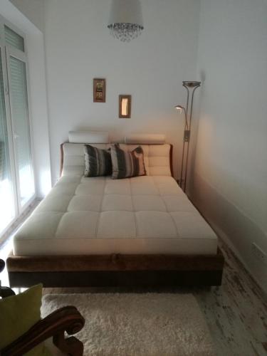 Postel nebo postele na pokoji v ubytování Dolce Vita Apartman