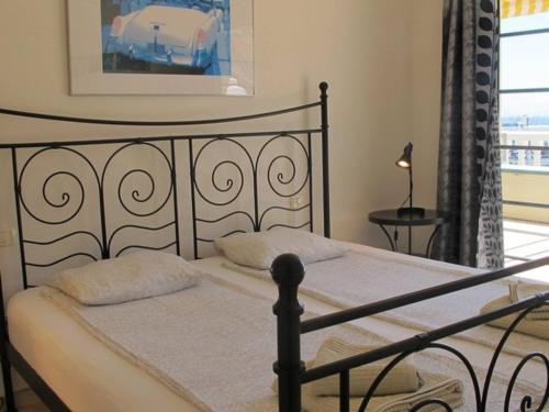 En eller flere senge i et værelse på Playa De Mogan Mirador 8 by El Sirocco