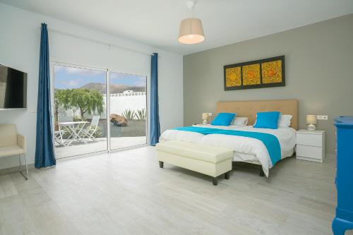 A bed or beds in a room at The view lanzarote