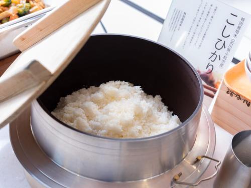 a pot of rice sitting on top of a stove at Super Hotel Umeda Higobashi in Osaka