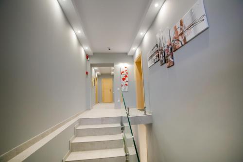a hallway with stairs in a building at Villa Umberti in Sibiu