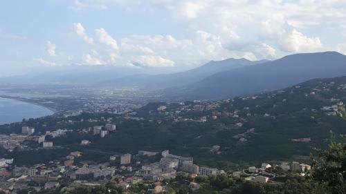 an aerial view of a city and a body of water at Ribellu in Bastia