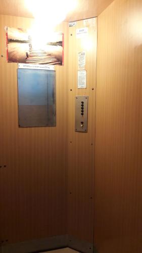 a room with a door with a sign on it at 1+1 Znojmo in Znojmo