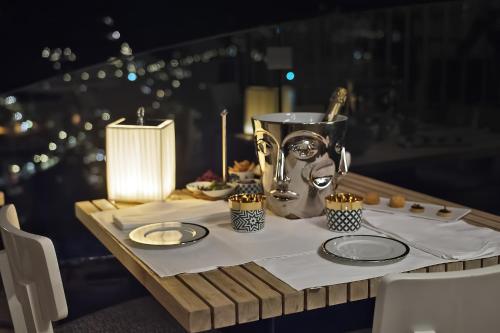 a table with a blender on top of a table at Hotel Villa Franca in Positano