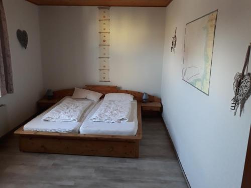 a bedroom with two beds in a room at Apartment Ahoi in Büsum