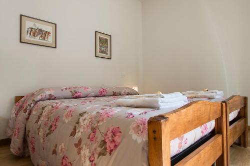 Postel nebo postele na pokoji v ubytování B&B Querceto