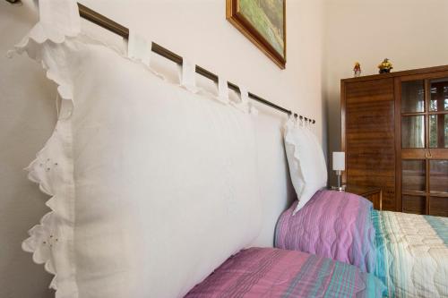 Postel nebo postele na pokoji v ubytování B&B Querceto