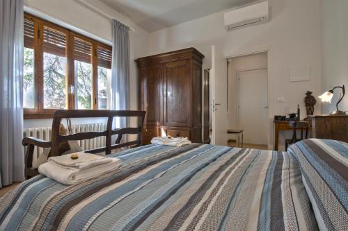 Postel nebo postele na pokoji v ubytování B&B Querceto