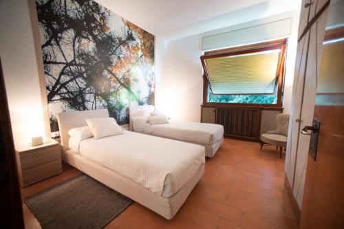 Ένα ή περισσότερα κρεβάτια σε δωμάτιο στο B&B Parco Antico