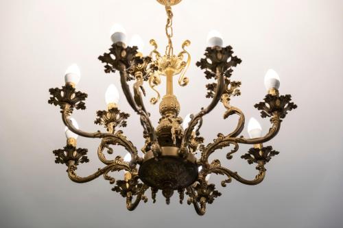 a chandelier hanging from a ceiling at Charlino Plaza in Ruse