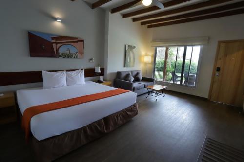 Llit o llits en una habitació de Casa Andina Standard Chincha