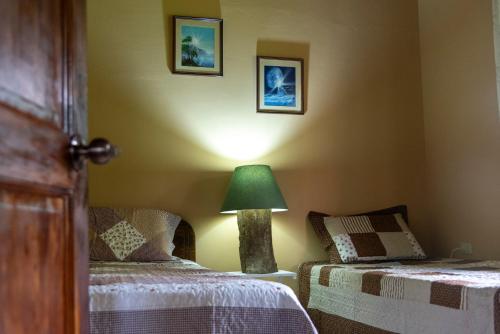Postelja oz. postelje v sobi nastanitve Las Calas Lodge