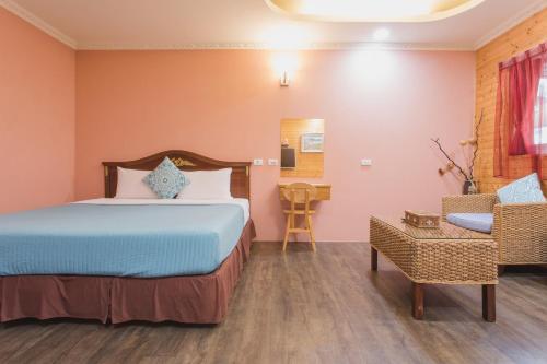 Postel nebo postele na pokoji v ubytování Hai Yuan Bungalow II