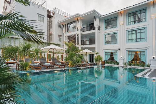 Poolen vid eller i närheten av Anio Boutique Hotel Hoian