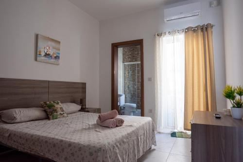 Легло или легла в стая в Seafront apartment between Valletta and Sliema