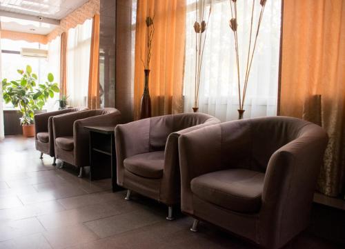 a row of chairs in a waiting room at Astana Hotel in Almaty