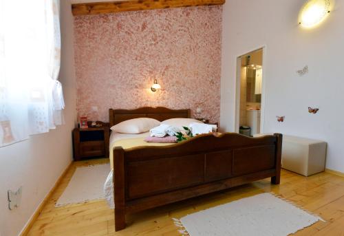 Katil atau katil-katil dalam bilik di Bed and Breakfast Casa Rustica