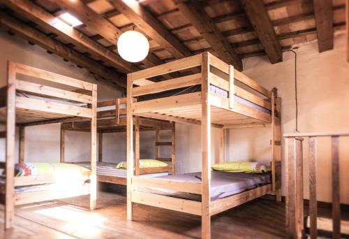 Postel nebo postele na pokoji v ubytování Masia Mediterranian Country House Ca l'Isidre Torrent