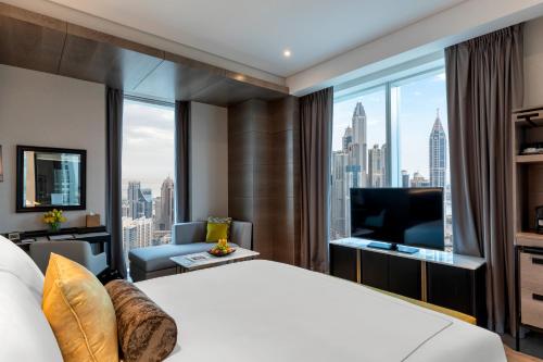 Postel nebo postele na pokoji v ubytování Taj Jumeirah Lakes Towers