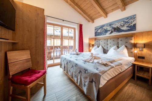 Llit o llits en una habitació de Alpin Residenzen Panoramabahn by Alpina-Holiday