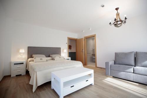 Ένα ή περισσότερα κρεβάτια σε δωμάτιο στο La Posada de Ojebar Nórdica