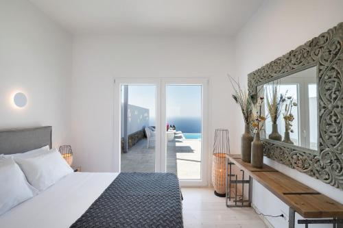 Postel nebo postele na pokoji v ubytování Villa Semeli Syros by Divine Property SA
