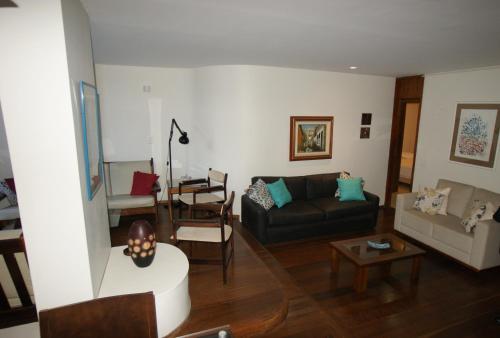 a living room with a couch and a table at xxxxxxxxxxxxxxxxxxxxxxxxxxxxxxxxxxxxxxxxxxxxxxxx in Rio de Janeiro