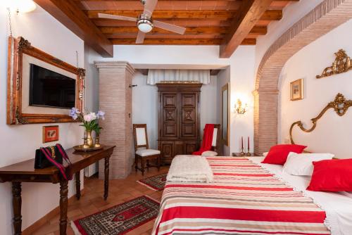 Katil atau katil-katil dalam bilik di Agriturismo La Rombaia