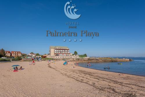 a view of a beach with people on it at Hotel Norat Palmeira Playa in Ribeira