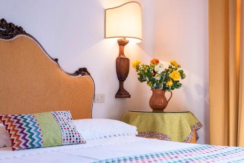 Katil atau katil-katil dalam bilik di Agriturismo La Rombaia