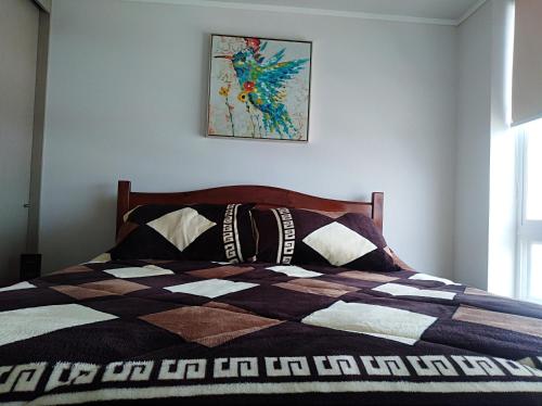 Llit o llits en una habitació de concon departamento