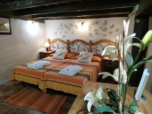 Posteľ alebo postele v izbe v ubytovaní Casa Tata
