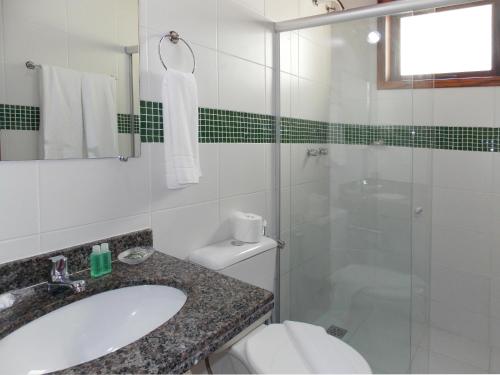 Ett badrum på Pousada Caiçara
