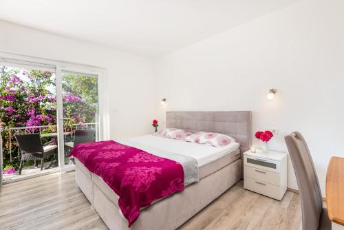 Postel nebo postele na pokoji v ubytování Apartment Nino