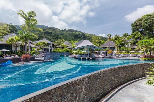 a pool at the resort at Mandarava Resort and Spa, Karon Beach in Karon Beach