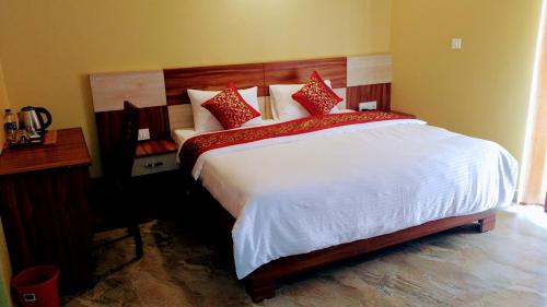 Una cama o camas en una habitación de Sakura Guest House