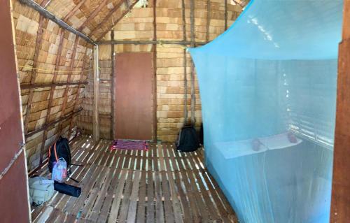 an inside view of a building under construction at Mr. Chuoi Bar and Hut in Ko Phra Thong