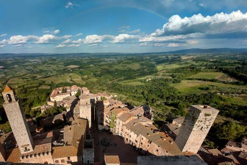 an aerial view of a medieval city with buildings at Casa di Pierina in Poggibonsi