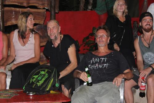 a group of people sitting on a couch at Mitra Hostel in Arambol