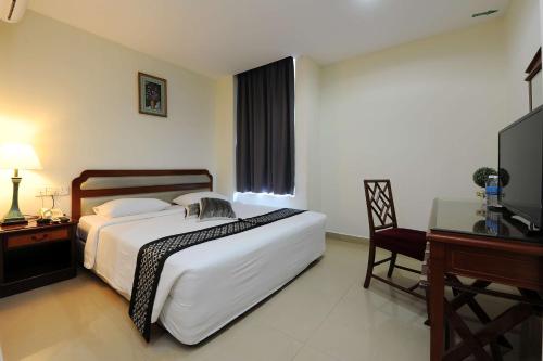Postel nebo postele na pokoji v ubytování Palm Inn Ampang Point